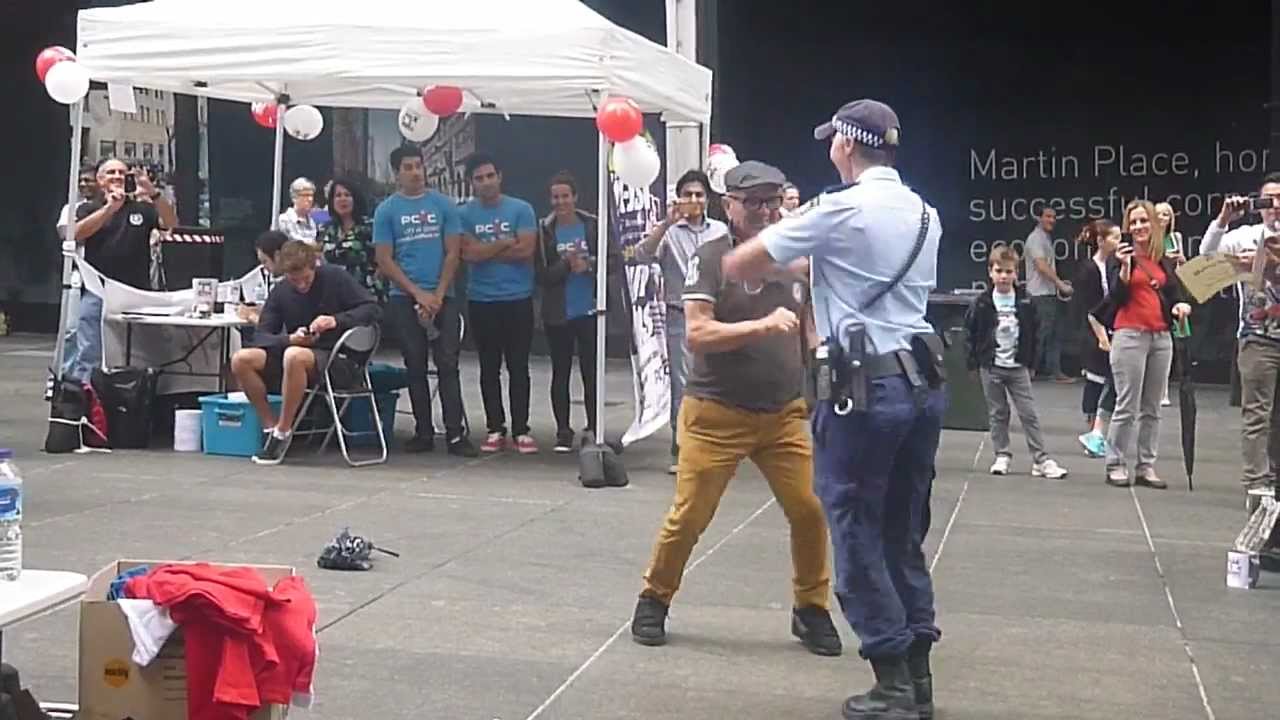 Awesome Australian Policewoman Gets Down With Street Performer