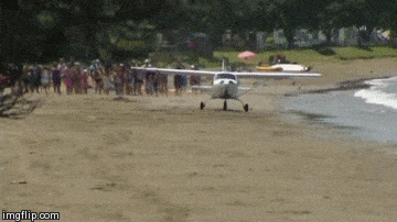 Plane Takes Off At Beach