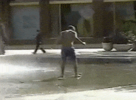 Kid In The Sprinkler