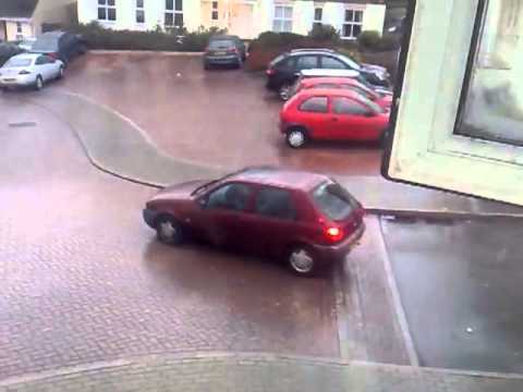 Watch These Drivers Hop Out Of A Moving Car Skidding On Ice